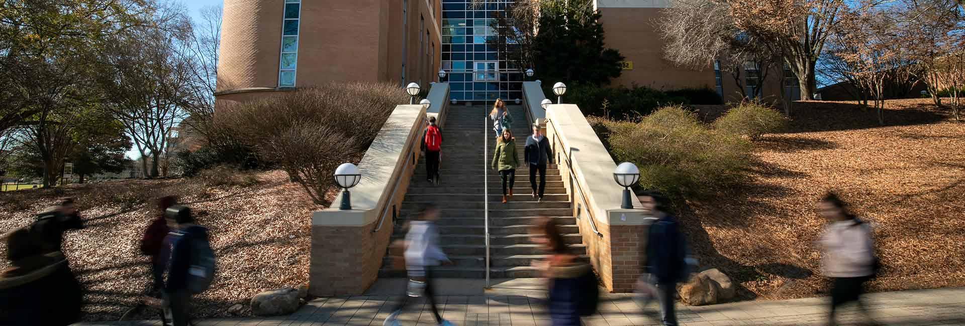 ksu students walking up stairwell outside kennesaw campus